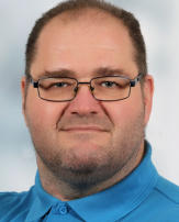 Add your one line caption using the Image tab of the Web Properties dialog